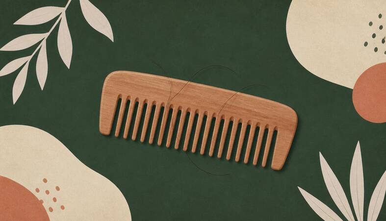 Illustration of a wooden comb with a few loose strands of hair on it